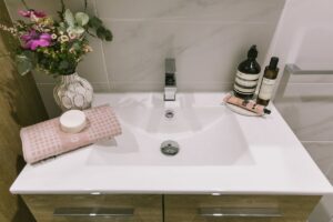 Bathroom renovation and styling for a one bedroom serviced apartment