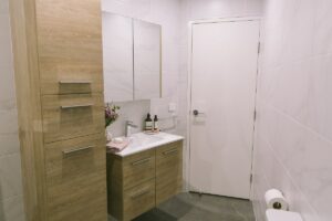 Bathroom renovation and styling for a one bedroom serviced apartment
